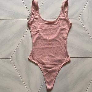 Pink bodysuit